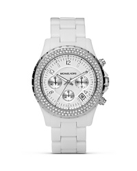 The chronograph is the new face of time. Here, from MICHAEL Michael Kors in bright white with crystal embellished bezel. With three-eye design and sweep second hand.