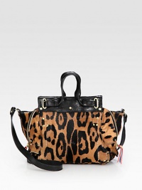 A slouchy shape in super-chic leopard-printed pony hair, finished with rich calfskin leather accents and side gussets. Double leather top handles, 2½ dropLeather shoulder strap, 18 dropMagnetic snap closureOne inside zip pocketOne inside open pocketCotton lining7¾W X 7¼H X 4DImported