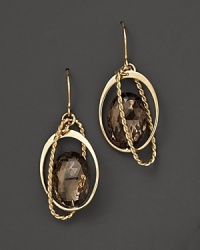 Oval freeform smoky quartz briolettes add rich sparkle to links of 14K yellow gold. By Nancy B.