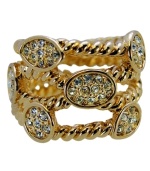 A distinguished design. Sparkling clear crystals in a beautiful bezel setting stand out on this stylish twist ring from T Tahari's Essentials Collection. Made in gold tone mixed metal, it's nickel-free and well suited for sensitive skin. Size 7.