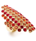 Go bold or go home with this sparkling style. Style&co.'s statement-maker covers the span of two knuckles with a gradation of coral and red glass stones. Set in gold tone mixed metal. Ring stretches to fit finger.