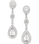 Refined glamour. Eliot Danori's dazzling drop earrings will catch the light with round, pear, and marquise-cut cubic zirconias (10-7/8 ct. t.w.) set in silver tone mixed metal. Approximate drop: 2-1/8 inches.