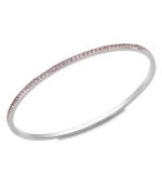 Say it from the heart. Swarovski's Heart Truth 2012 bangle is crafted from stainless steel and catches the light with light rose-colored Swarovski crystals. Bracelet slips easily over the wrist. Approximate diameter: 2-1/2 inches.