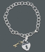 Lock your heart...but don't throw away the key. Keep them side by side on this darling sterling silver bracelet featuring a diamond heart charm (1/5 ct. t.w.) and 14k gold key. Approximate length: 7 inches. Approximate charm drop: 7/8 inch.