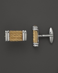 Charriol's classic nautical cable cufflinks lend timeless polish.