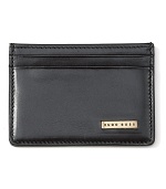 Wrought in quality burnished leather, this slim credit card case features a logo plaque on the front, clear ID holder and 2 exterior credit card slots.