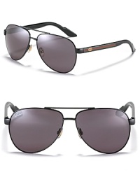 Sleek aviator sunglasses with mirror lenses and double bridge design from Gucci.