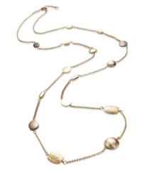 Layer on some lovely length with this golden necklace from Alfani. Displays hematite and gold tone beads for a shaky feel. Crafted in gold tone mixed metal. Approximate length: 51 inches.