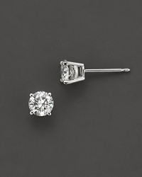 Diamond stud earrings in 18K white gold.