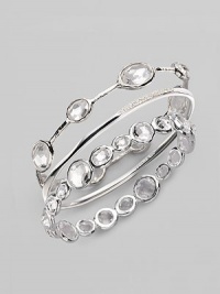 From the Paparazzi Collection. Ovals of faceted clear quartz shimmer within a bangle of polished sterling silver. Clear quartz Sterling silver Diameter, about 2¾ Imported Please note: Bracelets sold separately.