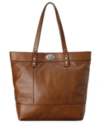 Opt for artisanal accessorizing with this take-anywhere tote from Fossil. Buttery-soft leather is outfitted with signature detailing, while the generous interior easily stows, eReader, PDA, makeup case, and more.