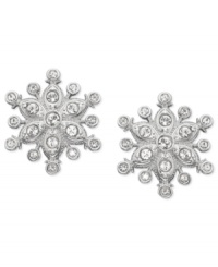 With a winter-inspired motif, Swarovski's pair of pierced earrings is ideal for the cold months. It sparkles in clear crystal pavé and delicately crafted, rhodium-plated metal. Fancy pear-shaped crystals add a touch of classic elegance. Approximate diameter: 3/5 inch.