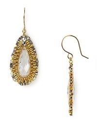 Balance the delicate with the dramatic. With faceted stones and intricate beads, Miguel Ases' teardrop earrings are a striking choice.