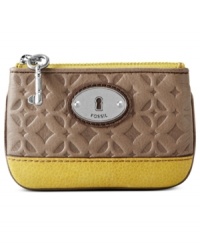 Make a change. Start with this petite coin purse from Fossil that showcases a decidedly signature style. Luxe logo-embossed leather is accented with vintage-inspired accents, for an unmistakably money look you can take to the bank.