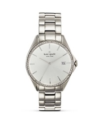 A crystal-encrusted bezel adds luxe sparkle to this stainless steel watch from kate spade new york.