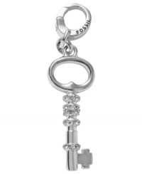 Opening statement. Fossil unlocks any style barriers with this key charm, crafted from silver-tone mixed metal and featuring clear glass crystal. Approximate length (charm): 1-1/4 inches; (clip): 1/2 inch.