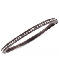 Sleek and stunning. Vince Camuto's thin bangle bracelet is crafted from chocolate-tone mixed metal with a dazzling array of glass crystal accents for a fashion infusion. Approximate diameter: 3-1/2 inches.