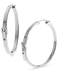 Inspired by classic belt silhouettes, these hoop earrings from Michael Kors are a chic creation to flaunt on the weekends. Crafted in silver ion-plated steel. Approximate length: 1-1/4 inches.