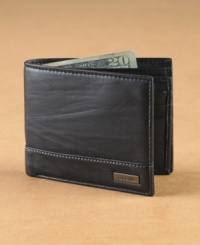 Classic sophistication for your essentials. Finish your outfit with this distinguished leather wallet from Guess.