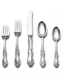 The exquisite sterling silver Queen Elizabeth pattern pays homage to a golden age. Delicate flowers grace the tip and intricate openwork finishes the neck of well-balanced flatware settings made for special occasions. From Towle.