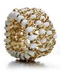 Bright pops of white lend a fresh, clean touch to any look. Style&co.'s stretch bracelet features white glass beads in an intricately-woven gold tone mixed metal setting. Approximate length: 7 inches.