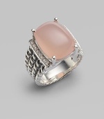 From the Wheaton Collection. A faceted cushion of milky pink opal, edged by rows of diamonds, in a wide cable band of sterling silver.Diamonds, 0.16 tcw Pink opal Sterling silver Width, about ½ Imported