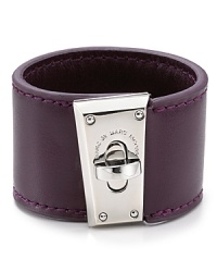 Pop and turnlock it with this tough-chic leather bracelet from MARC BY MARC JACOBS. The bold brass hardware lends this chunky showpiece serious edge.