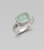 From the Noblesse Collection. A beautiful cabochon of aqua chalcedony surrounded in dazzling diamonds on a sterling silver shank. Aqua chalcedonyDiamonds, .21 tcwSterling silver Width, about .31Imported 