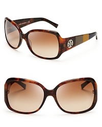 Seasonless tortoise shades take on the colorblock trend in this Tory Burch design.