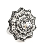 Scintillating and sparkling. Showcasing a majestic medallion silhouette, Judith Jack's marcasite, crystal and cubic zirconia (1-9/10 ct.) ring will be a chic addition to your next cocktail party ensemble. Set in sterling silver. Size 7.