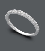 Wear this sparkling ring as a wedding band that pairs nicely with any engagement ring, or create a more modern look as you stack it with other rings on your middle finger. Either way, Arabella's stunning ring will add shine with the addition of a seamless row of round-cut Swarovski zirconias (1 ct. t.w.). Set in 14k white gold.