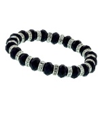 Black is the new black! Bedecked with jet and clear crystals, 2028's stretch bracelet is a timeless, versatile look you'll cherish. Crafted in silver tone mixed metal, it slips on and off with ease. Approximate diameter: 2-1/4 inches.