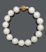 Refine your look with simple and sophisticated pearls. Bracelet features A+ cultured freshwater pearls (11-13 mm) with an ornate 14k gold circular clasp. Approximate length: 7-1/2 inches.