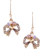 Add a little sweet shimmer to your look. Betsey Johnson's adorable bow earrings are decorated with round-cut clear crystals with small purple and pink cherry bead accents. Crafted in antique gold-plated mixed metal. Approximate drop: 1-3/4 inches.