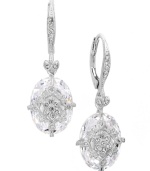 Breathtaking by design. Eliot Danori's intricate drop earrings features a faceted crystal drop decorated by a cubic zirconia-accented overlay (14 ct. t.w.). Set in silver tone mixed metal. Approximate drop: 5/8 inch.