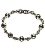 Polished sparkle. Givenchy's mixed metal hematite-plated bracelet features black glass stones. Approximate length: 7-3/8 inches.