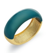 Charter Club's slip-on bangle bracelet flaunts the eye-catching combo of gold and teal, for a stylish effect. Crafted in gold tone mixed metal. Approximate diameter: 2-1/4 inches.