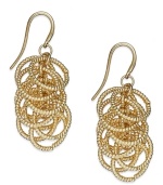 Intertwining strands of tubular chains create a lasting effect on these drop earrings from Alfani. Crafted from gold tone mixed metal. Approximate drop: 1-1/4 inches.