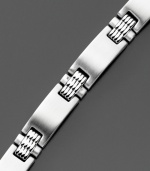 Stainless steel bracelet with ribbed detailing radiates a modern edge, perfect for every day. Length measures 8 inches.