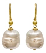 From the island of Mallorca, Spain, these white baroque organic man-made pearl (12 mm) drop earrings are set in 18k gold over sterling silver and feature a 14k gold post. Approximate drop: 1/2 inch.