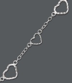 Open your hear to polished style. Giani Bernini's intricate filigree heart bracelet features a polished sterling silver chain and setting. Approximate length: 7-1/4 inches.