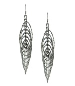 Create an optical illusion. Cut-out ovals stacked on top of one another form a layered pattern in BCBGeneration's dramatic drop earrings. Crafted in silver tone mixed metal. Approximate drop: 3 inches.