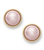 Perfection in pink. Charter Club's sophisticated stud earrings feature simulated pink pearls in a gold tone mixed metal bezel setting and post backing. Approximate diameter: 1 inch.