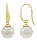 From Spain comes Majorica's interpretation of a fashion classic: pearl earrings. Set in 18k gold over sterling silver, round white organic man-made pearls stun (10 mm). Approximate drop: 1-1/4 inches.