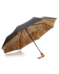 Adrienne Landau's compact umbrella is small enough to fit in your bag, but bold enough to make a statement.