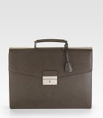 Saffiano leather double-gusset briefcase. Top handle Front push-lock closure with key lock Leather 14½W X 11H X 2½D Made in Italy 