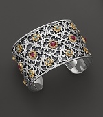 Inspired by ancient art, this sterling silver cuff features delicate 18K gold touches and polished stones of pink tourmaline and blue topaz. By Konstantino.