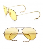 A sunny update to the classic aviator style, crafted in sleek, sophisticated metal with round temple tips. Available in gold with ambermatic lens.Metal temples100% UV protectionMade in Italy