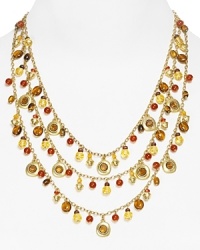 Lauren by Ralph Lauren channels exotic glamor with this tiered necklace. Crafted of 14 karat gold, its cascading charms and gorgeous, antique-effect stations have a far away feel.