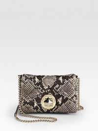 A quilted style in luxurious snake embossed leather with a chic chain strap.Chain shoulder strap, 22 dropTurnlock flap closureOne inside open pocketJacquard lining8W X 5H X 1½DImported